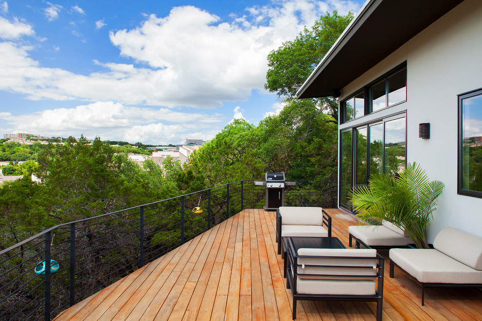 Überdachte Moderne Terrasse mit Grillplatz in Austin