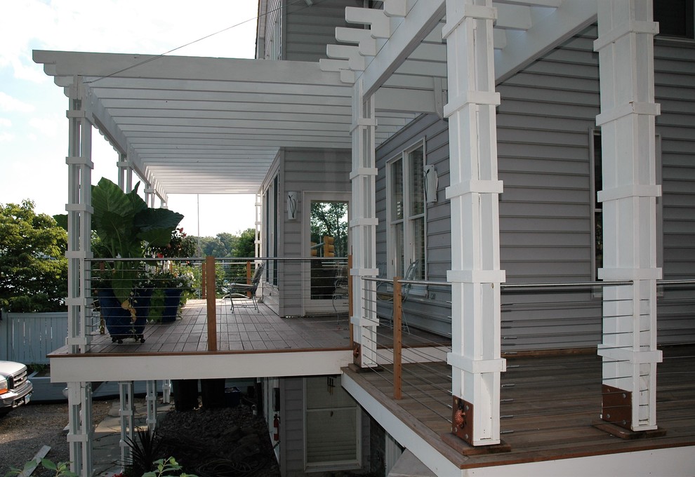 Inspiration for a large coastal rooftop deck remodel in Baltimore with a pergola