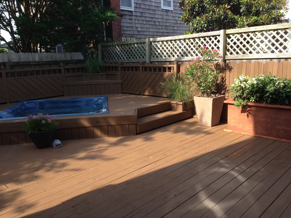 Design ideas for an expansive nautical back terrace in Other with no cover.