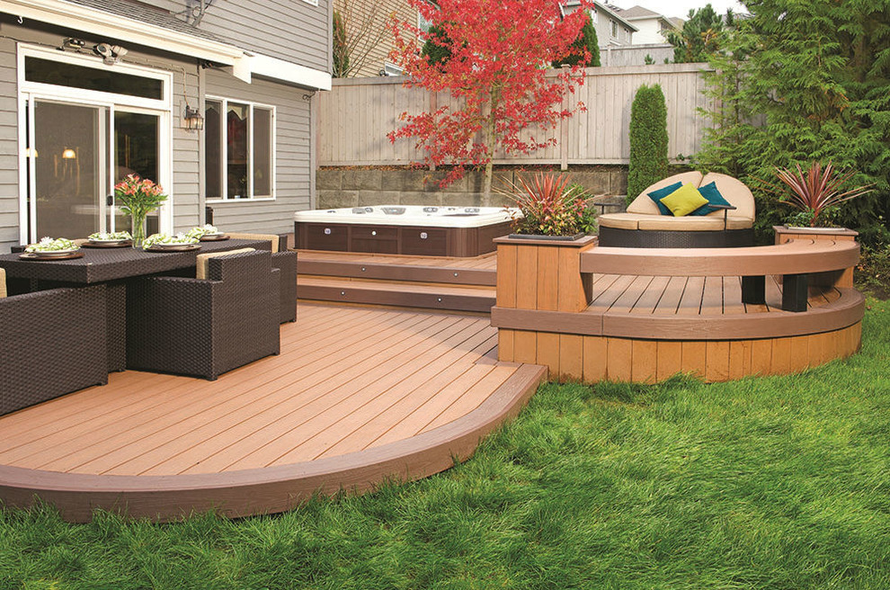 Inspiration for a mid-sized contemporary backyard deck container garden remodel in Cedar Rapids with no cover