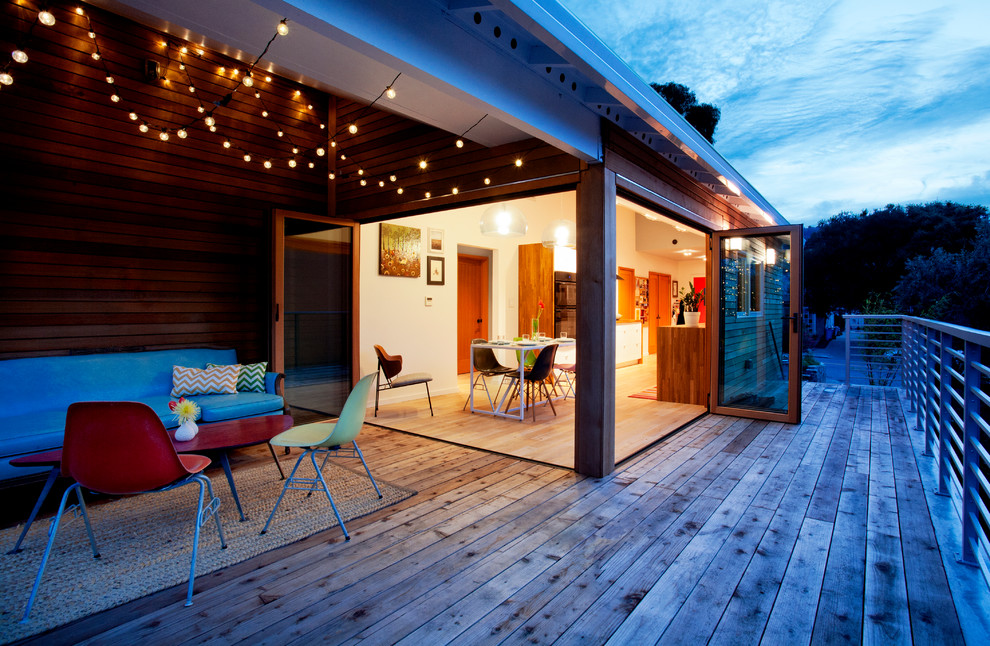 Example of a trendy deck design in San Francisco with a pergola
