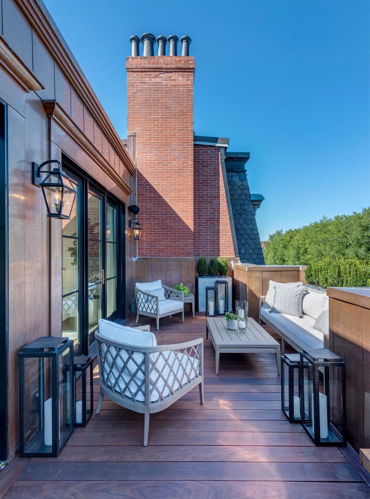 Inspiration for a traditional roof rooftop metal railing terrace in Boston with no cover.