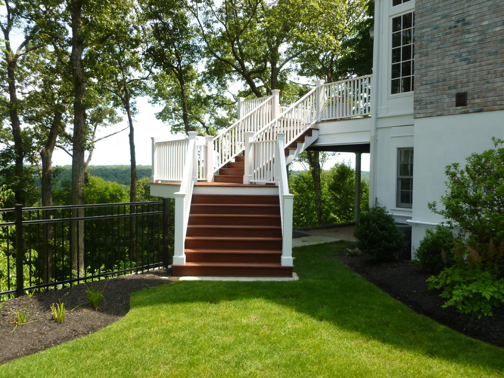 Deck - large traditional backyard deck idea in New York with no cover