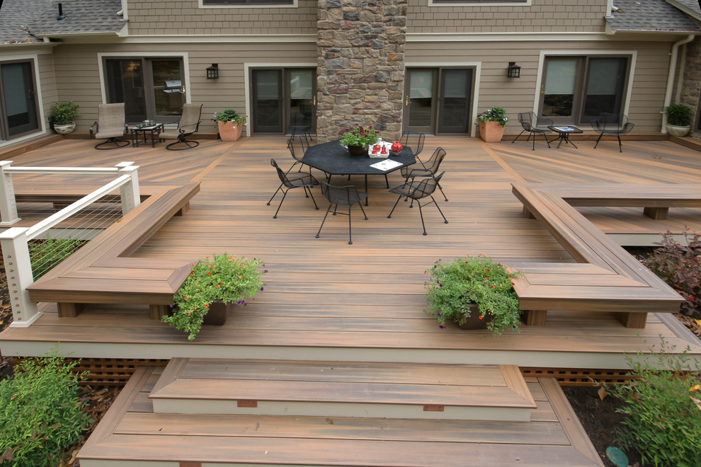 Inspiration for a large modern backyard deck remodel in Baltimore with no cover