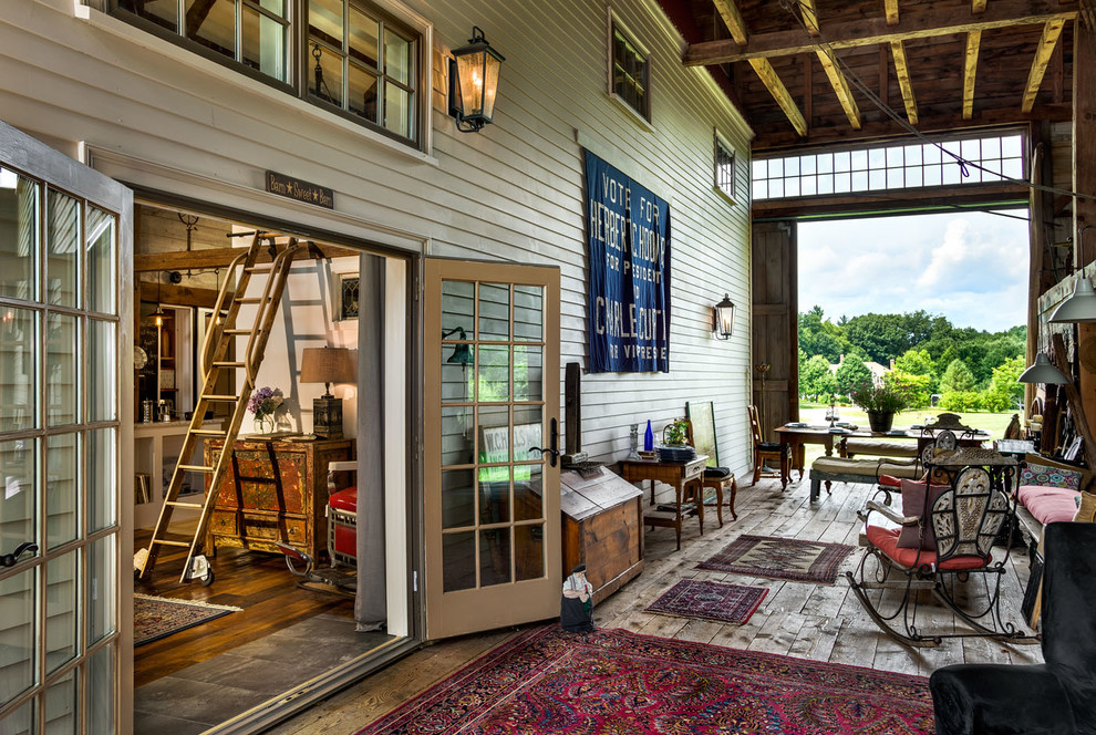 Photo of a country terrace in Boston with a roof extension.