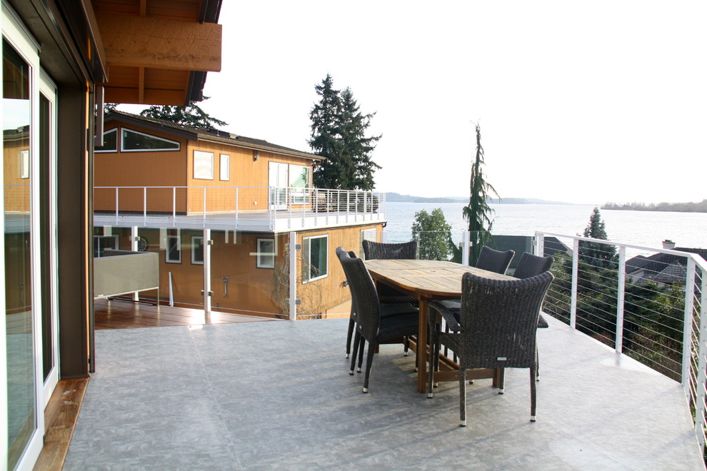 Immagine di un'ampia terrazza design sul tetto con nessuna copertura