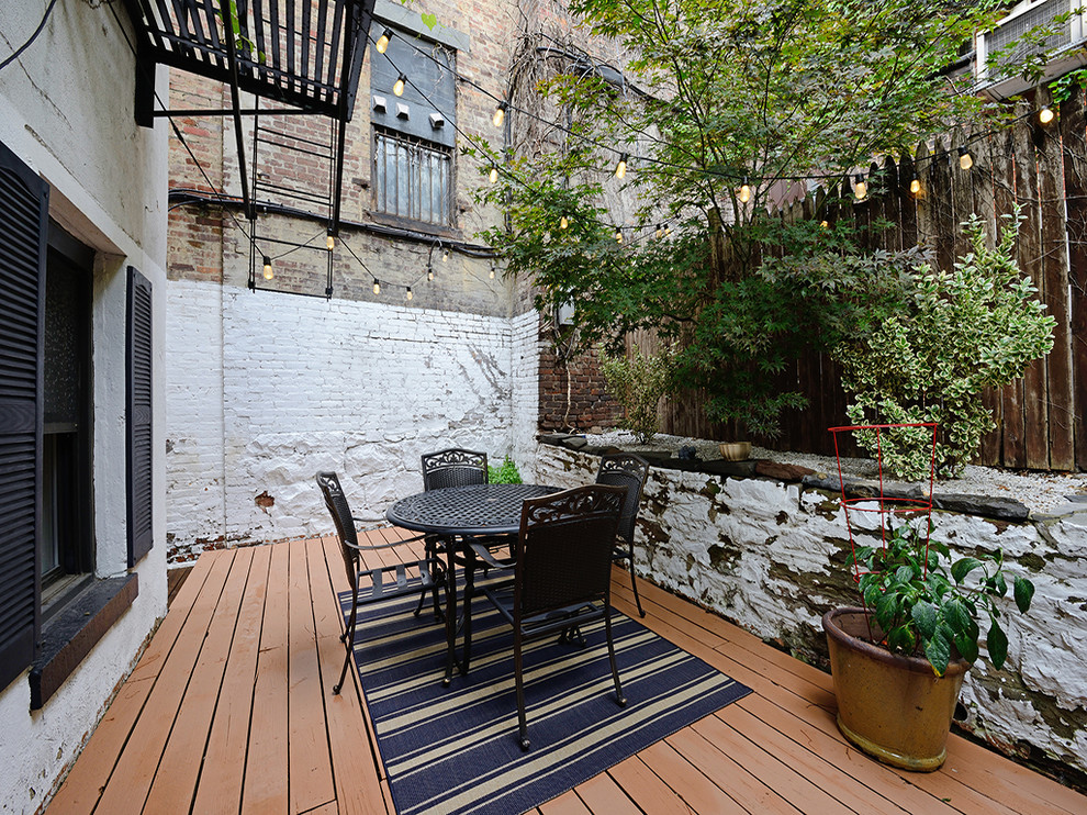 Classic terrace in New York with a potted garden and no cover.