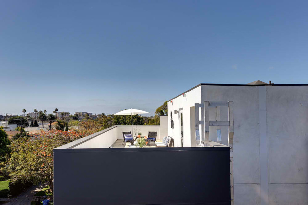 Imagen de terraza ecléctica en azotea
