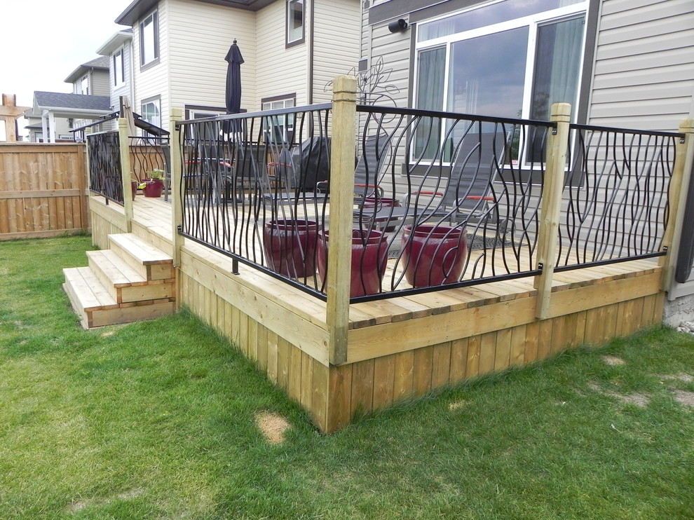 BENT railing design on a custom outdoor deck - Modern - Deck - Calgary ...