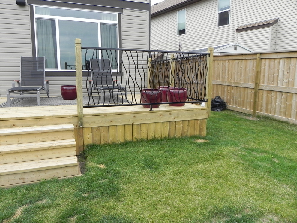 BENT railing design on a custom outdoor deck Modern Deck Calgary