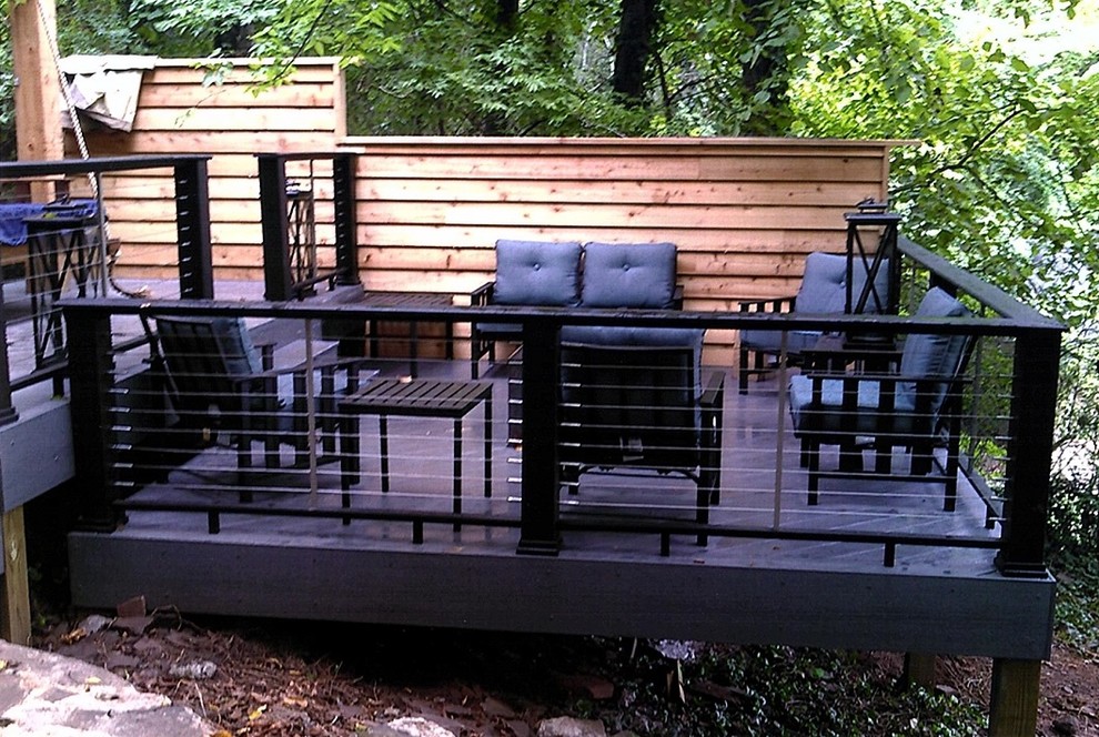 Inspiration for a small eclectic backyard deck remodel in Birmingham
