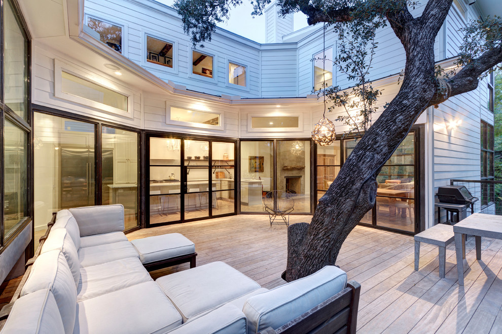 Inspiration for a large transitional backyard deck remodel in Austin with no cover