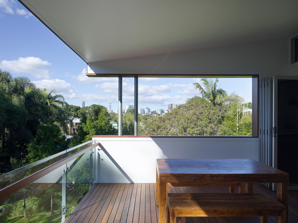 Deck - contemporary backyard deck idea in Brisbane with a roof extension