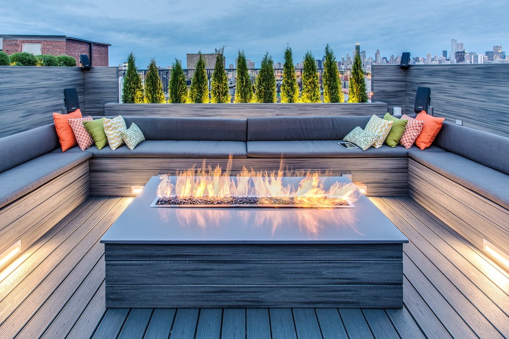Foto de terraza minimalista extra grande sin cubierta en azotea con brasero