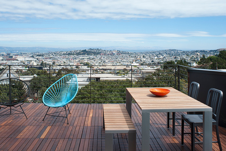 Example of a large minimalist rooftop deck design in San Francisco with no cover