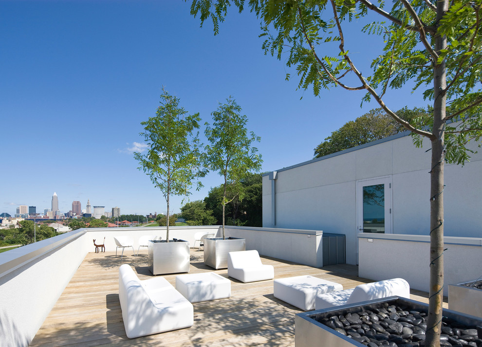 This is an example of a modern roof rooftop terrace in Cleveland with no cover.
