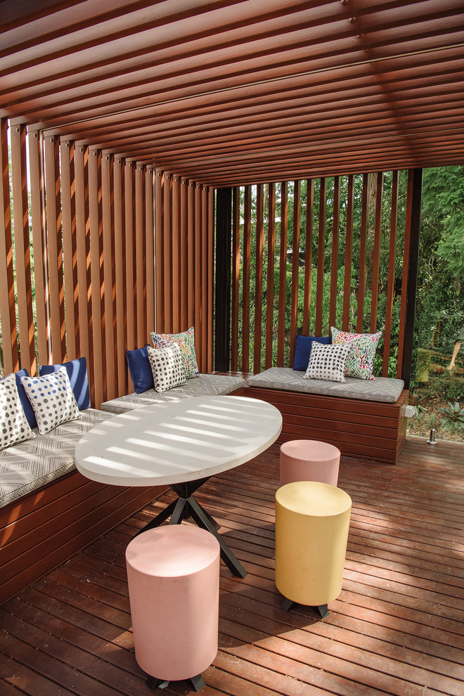 Inspiration for a contemporary terrace in Brisbane with a pergola.