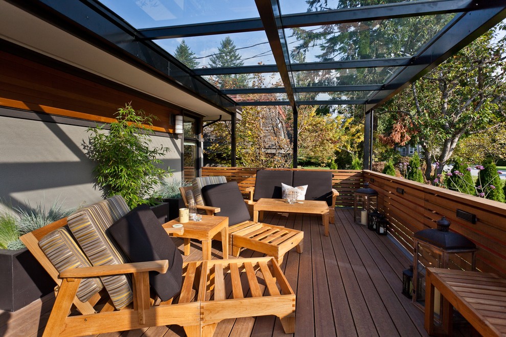 Photo of a small contemporary terrace in Vancouver with an awning.