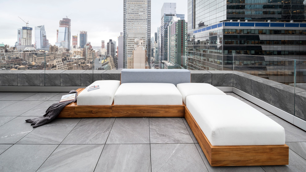 Photo of a large bohemian roof terrace in New York with no cover.