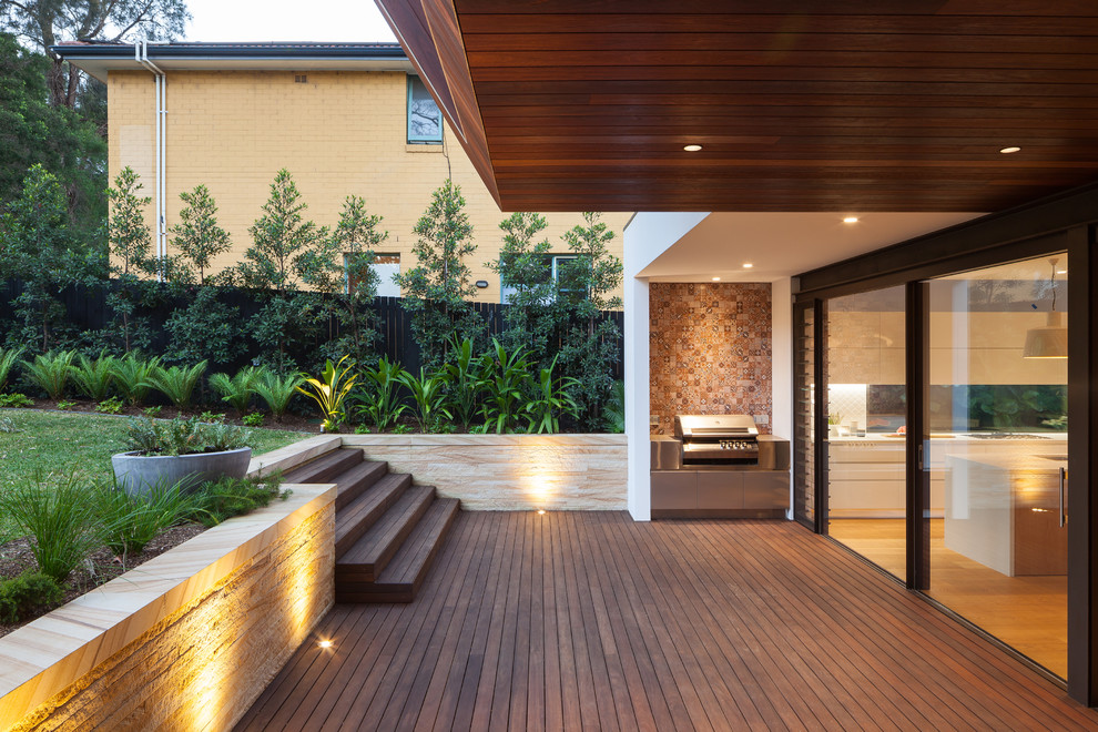 Large contemporary back terrace in Sydney.
