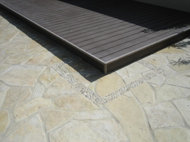 Inspiration for a mid-sized contemporary backyard water fountain deck remodel in Los Angeles with no cover