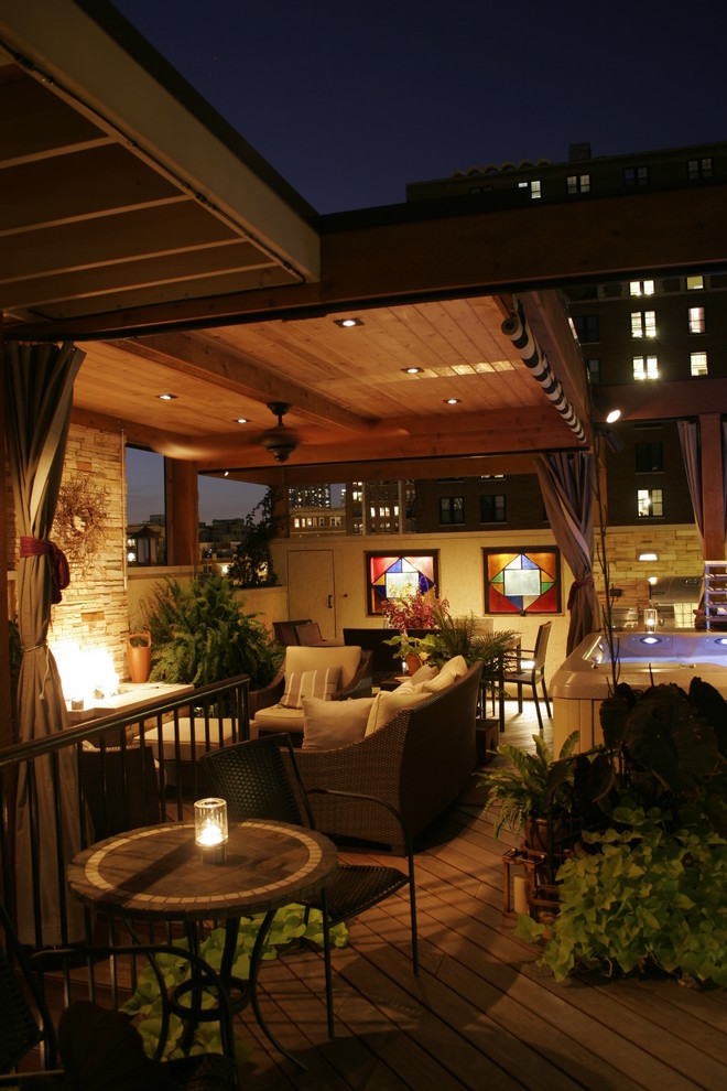 This is an example of a classic terrace in Chicago with a roof extension and feature lighting.