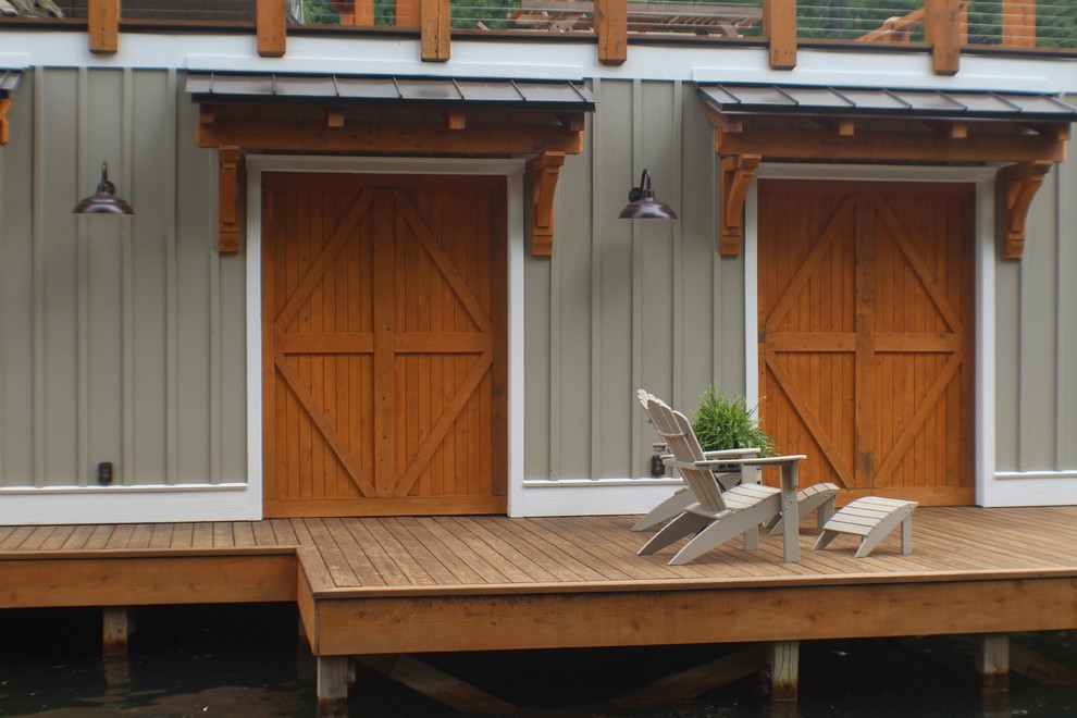 Example of a large arts and crafts backyard dock design in Atlanta with an awning