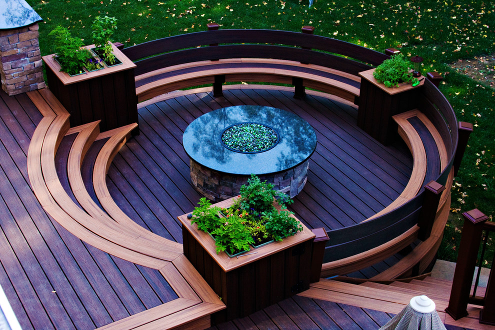 Inspiration for a mid-sized contemporary backyard deck remodel in Philadelphia with a fire pit and no cover