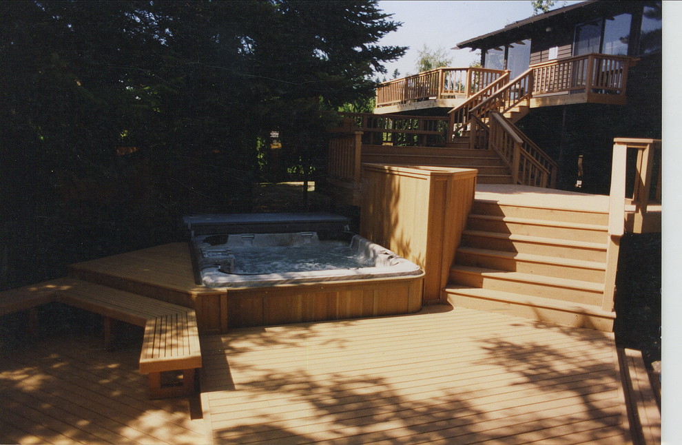 Deck - large traditional backyard deck idea in Seattle with no cover