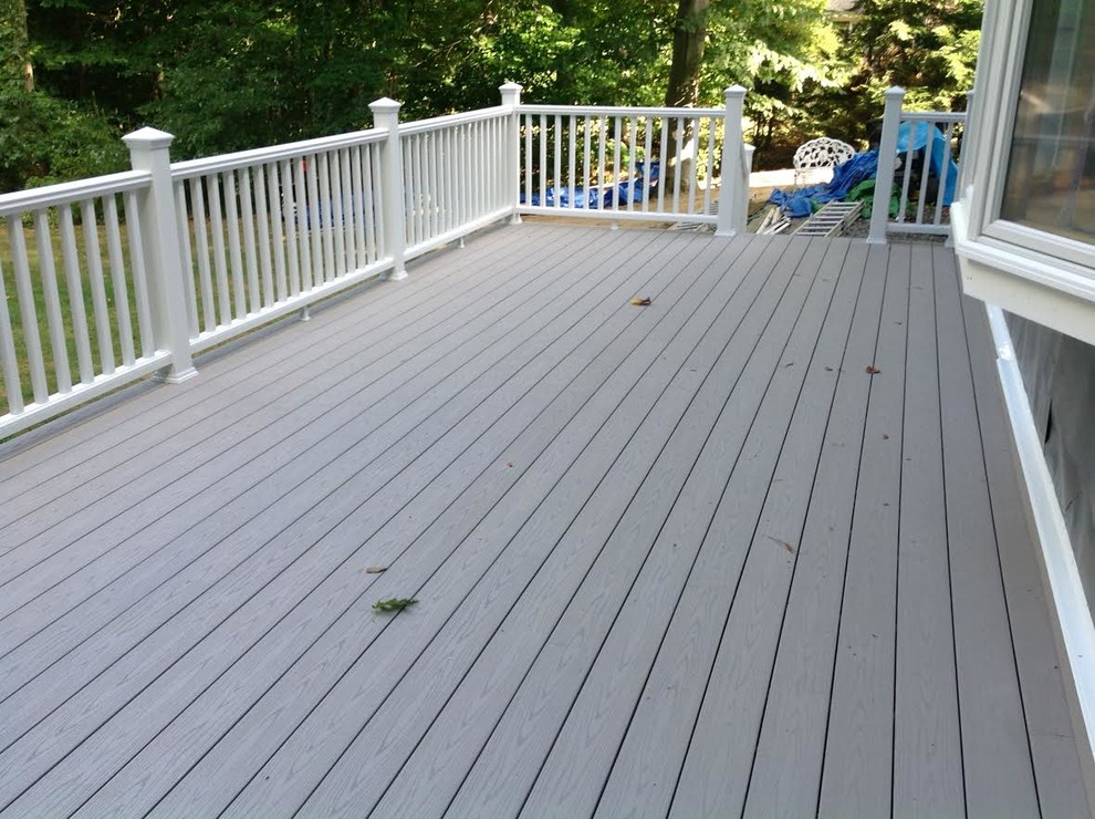 Inspiration for a large timeless backyard deck remodel in New York with no cover