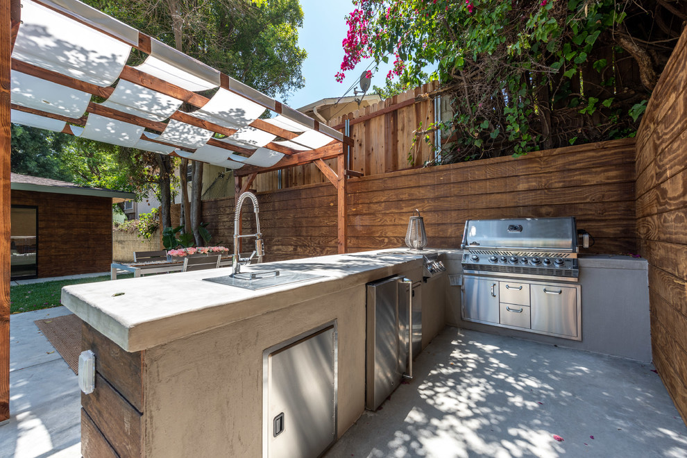 Concrete Outdoor Kitchen & Outdoor Dining Wrightwood Residence