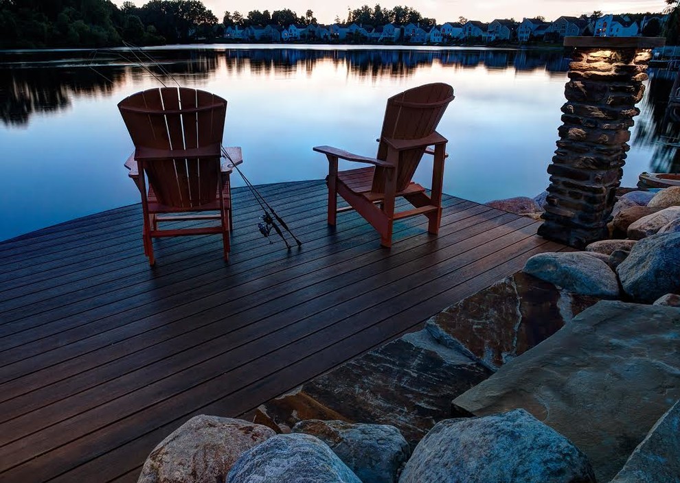 Design ideas for a small rustic back terrace in Cleveland with a dock and no cover.