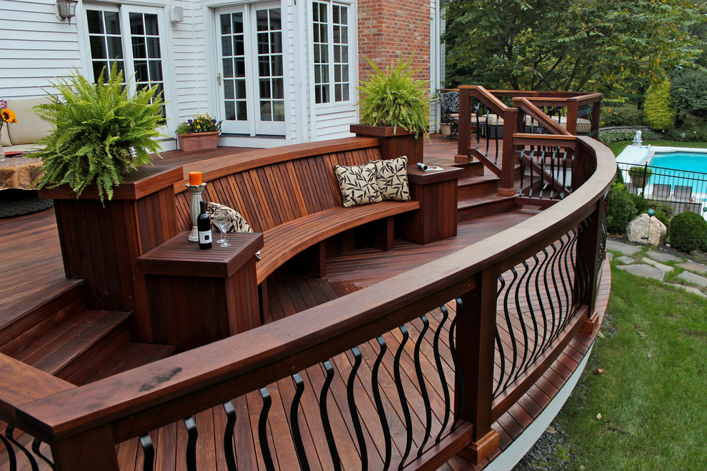 Inspiration for a contemporary backyard deck remodel in New York with no cover