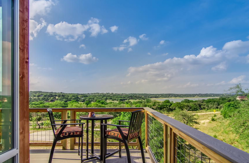 Mid-sized trendy side yard deck photo in Austin with no cover