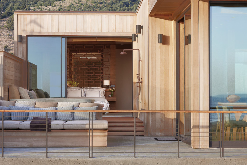This is an example of a large contemporary back terrace in San Francisco with no cover.