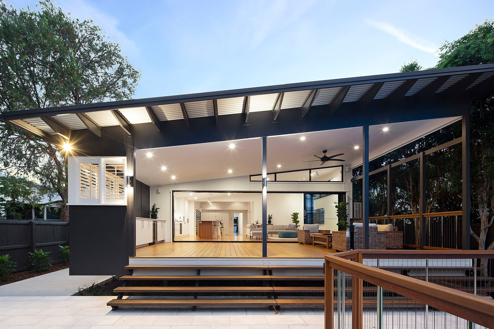 Outdoor kitchen deck - mid-sized coastal backyard outdoor kitchen deck idea in Brisbane with a roof extension