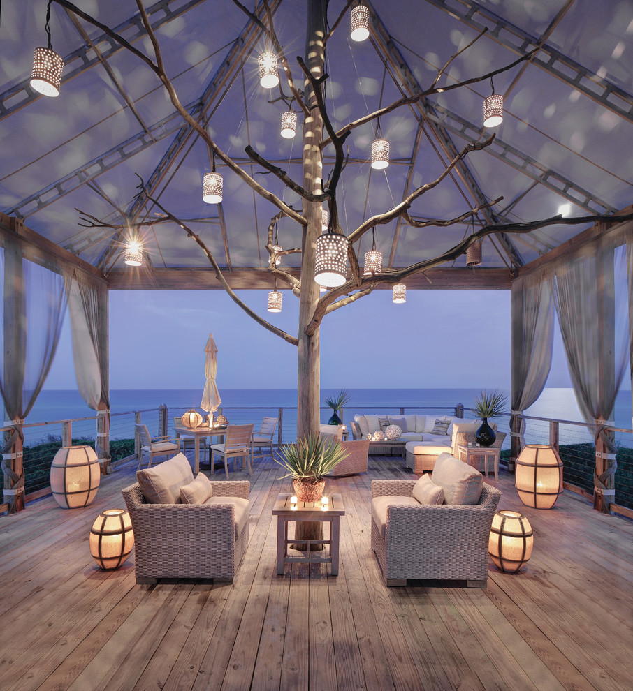 Inspiration for a coastal deck remodel in Minneapolis with a roof extension