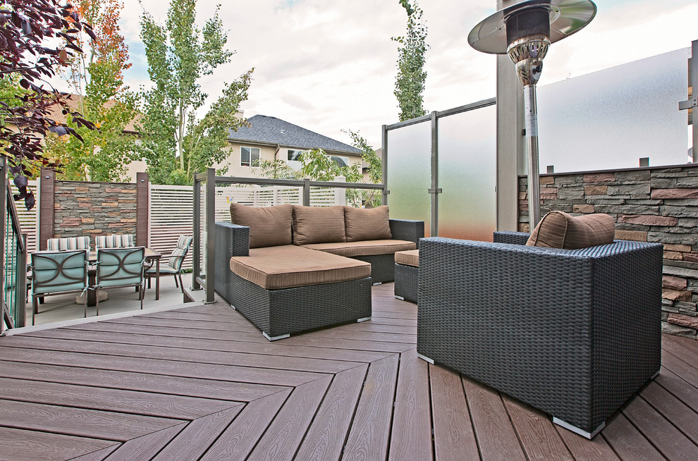 Design ideas for a large classic back terrace in Calgary with no cover.