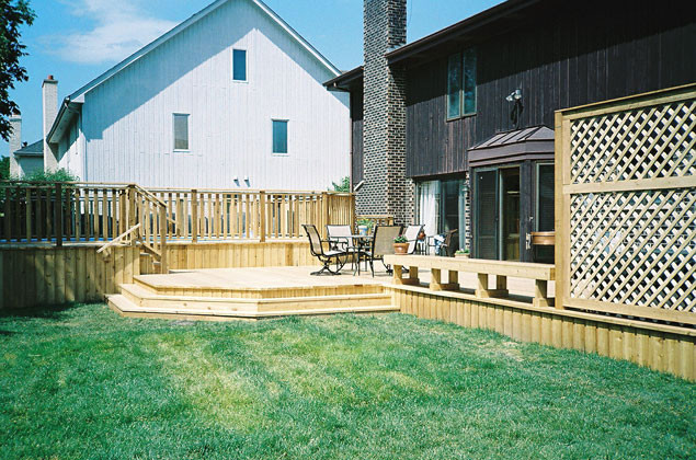 This is an example of a medium sized rustic back terrace in Chicago.