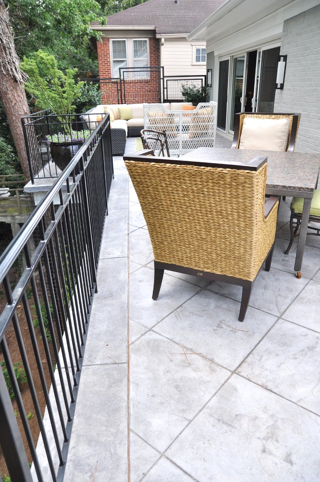 This is an example of a medium sized contemporary back terrace in Atlanta with no cover.