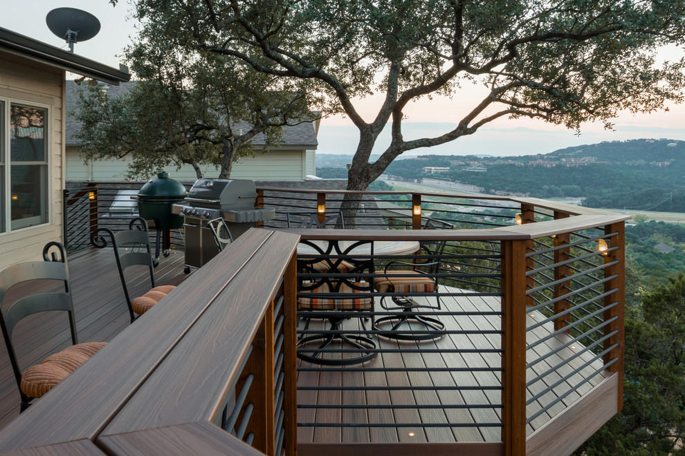 Inspiration for a large transitional backyard outdoor kitchen deck remodel in Austin with no cover