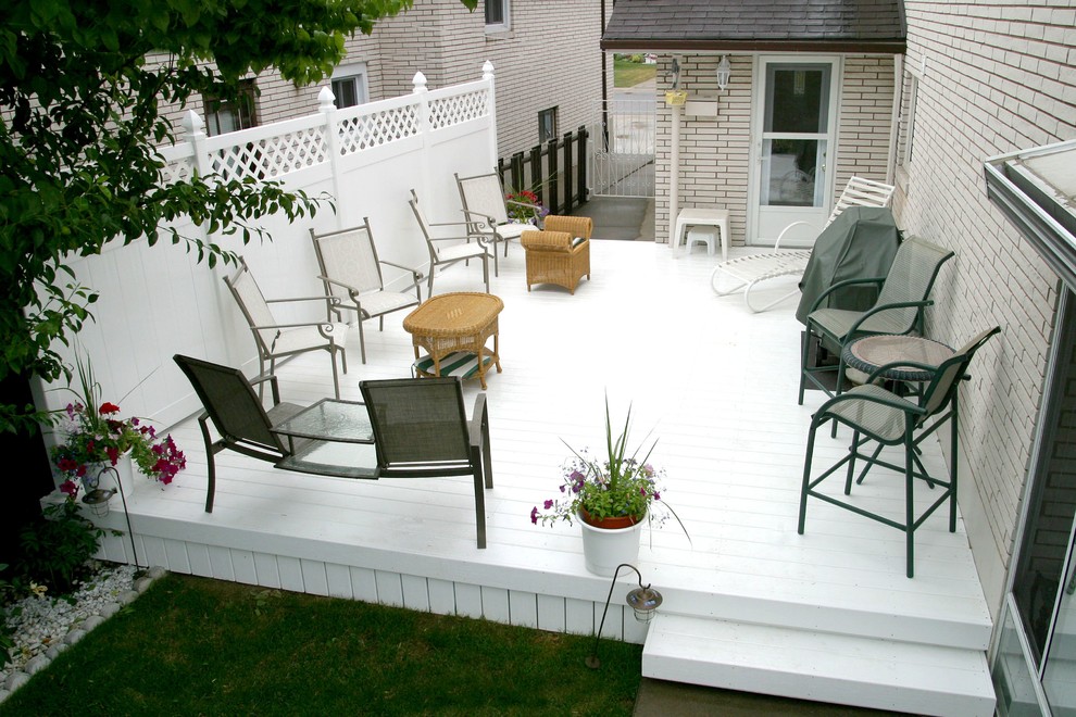 Medium sized modern back terrace in Toronto with no cover.