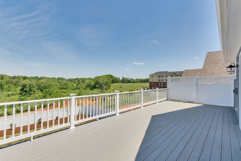 Cette photo montre une terrasse arrière nature avec une extension de toiture.