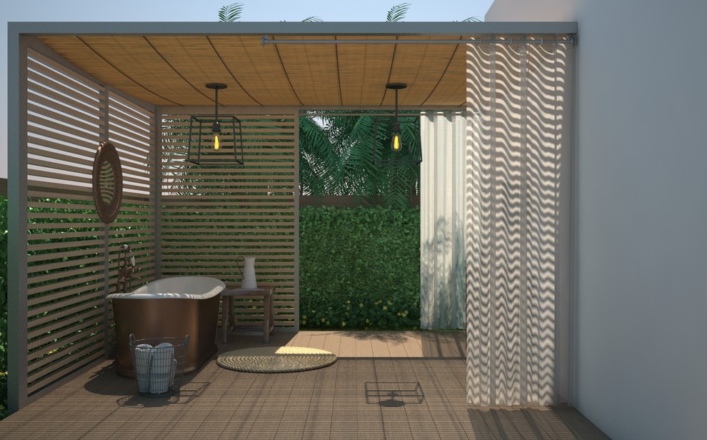 Example of a large trendy backyard outdoor shower deck design in Miami with a pergola