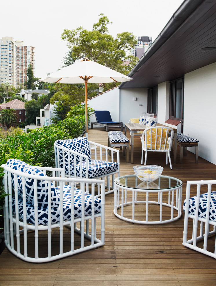 Transitional rooftop rooftop deck photo in Sydney with an awning