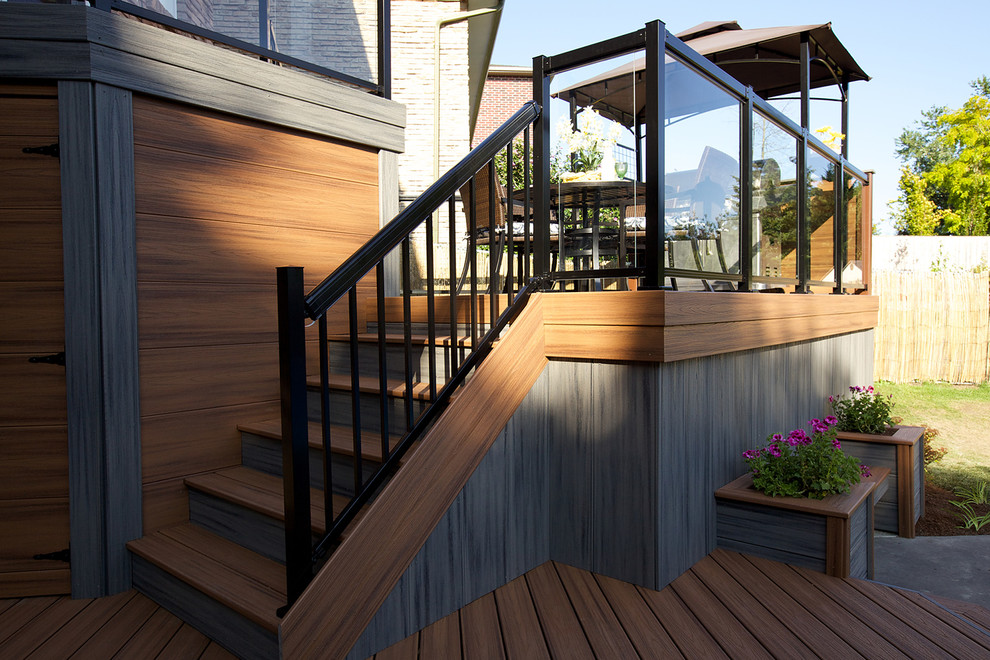 Inspiration for a medium sized contemporary back terrace in Toronto with an outdoor kitchen.