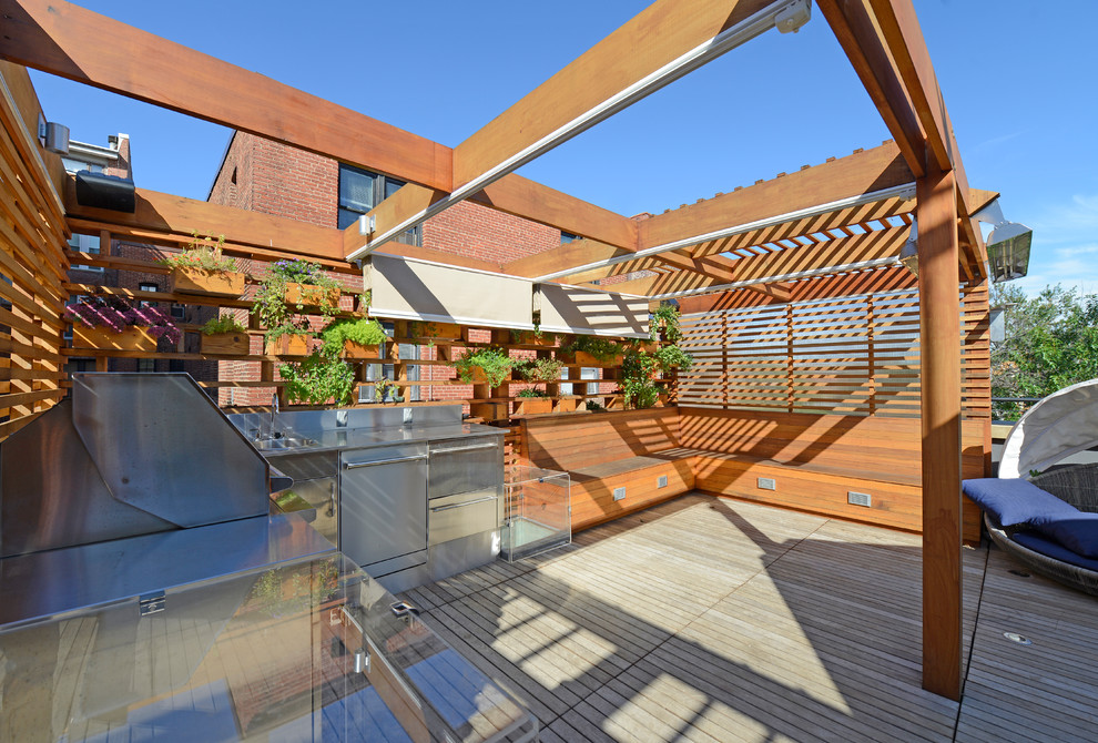 Inspiration för små moderna takterrasser, med utekök och en pergola