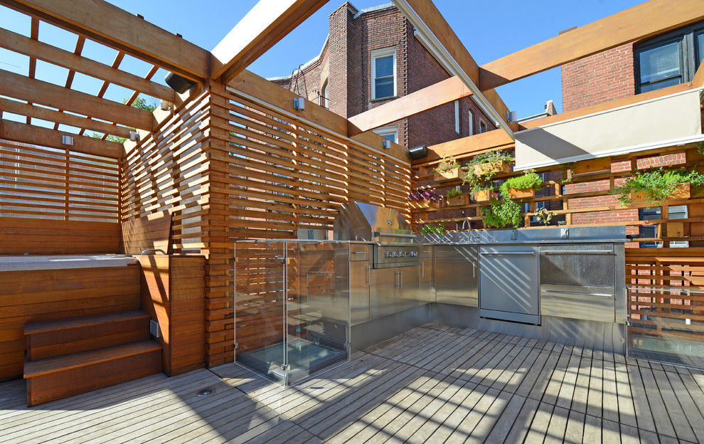 Example of a small minimalist rooftop water fountain deck design in DC Metro with a pergola