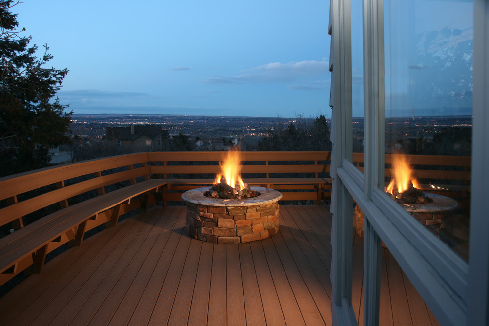 Large elegant backyard deck photo in Denver with a fire pit and no cover