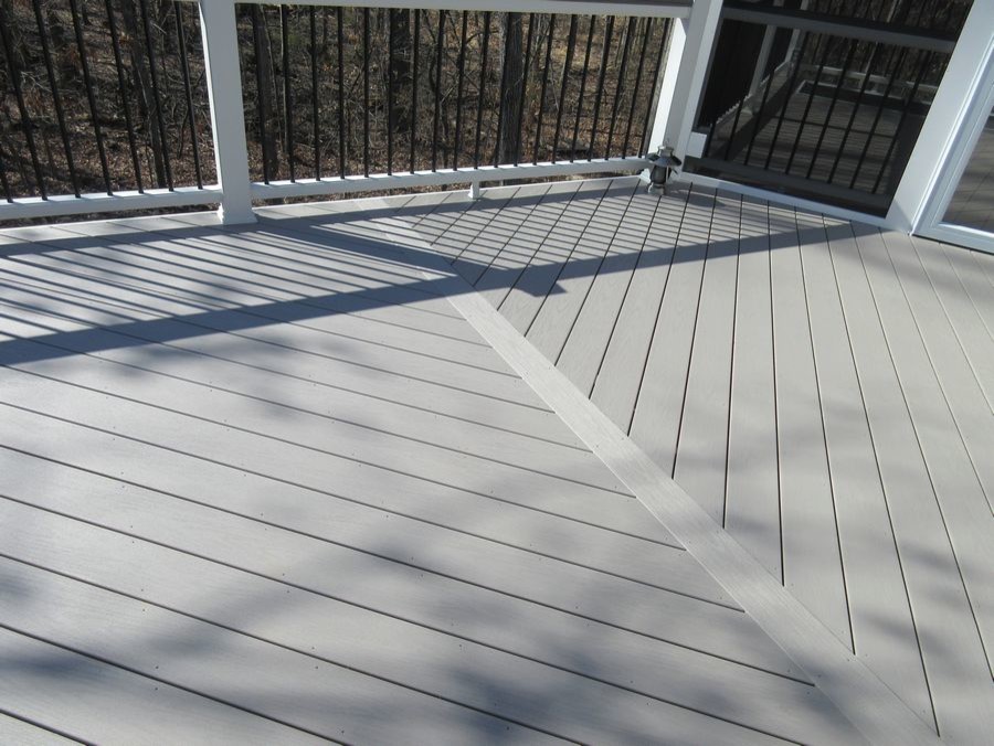 Deck in Wolf Harbor Grey decking in a Herringbone pattern